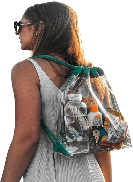Woman wearing a transparent backpack at an outdoor event